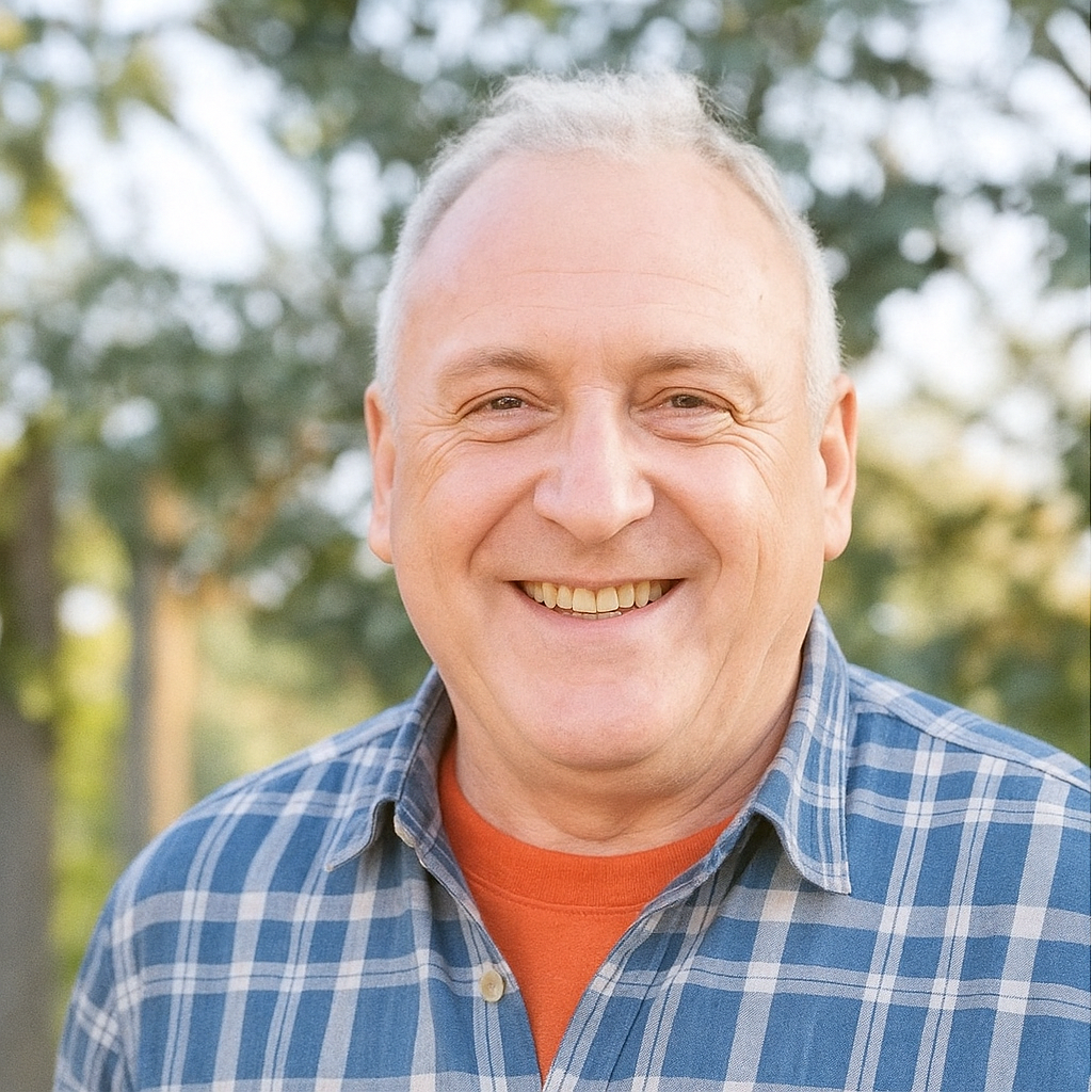 Mark Thompson smiling with confidence and clarity